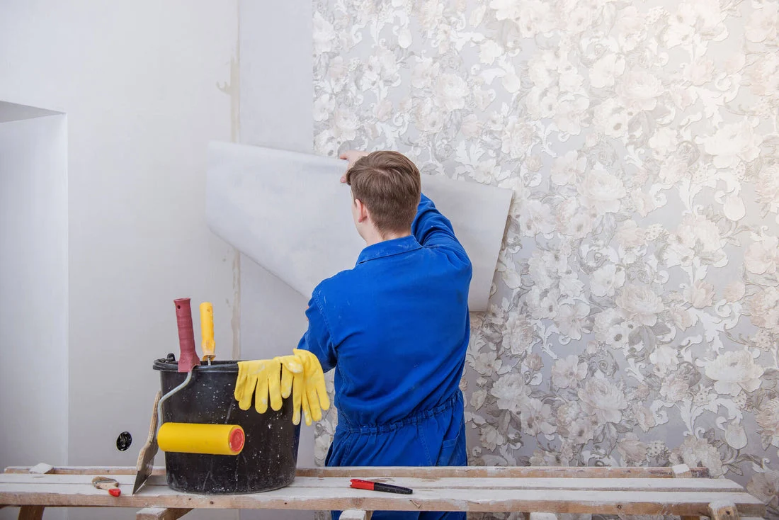 Professional wallpaper removal process in a Chicago home